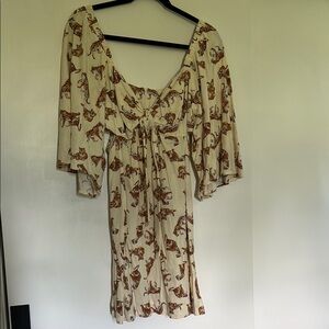 Elegant Cream Dress with Animal Print